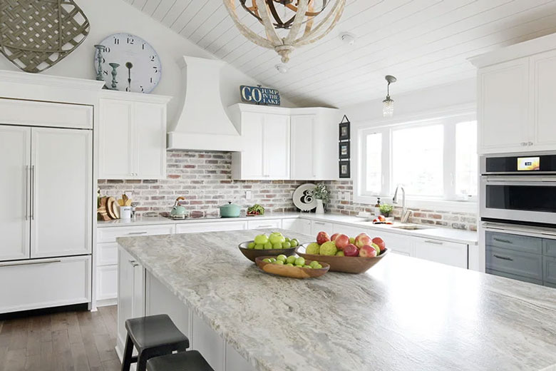 Decorate above kitchen cabinets with an oversized clock