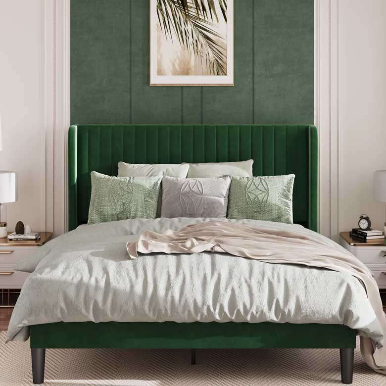 Green velvet upholstered wingback bed