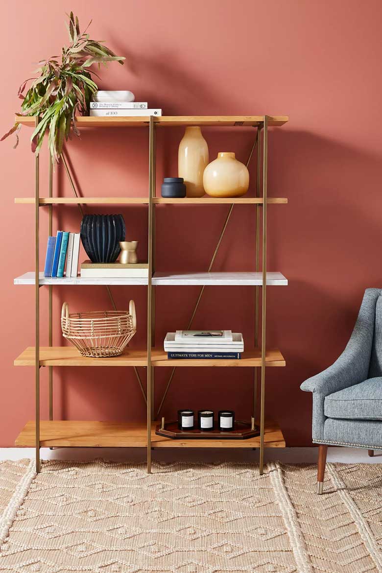 Modern bookshelf with natural oak and white marble shelves