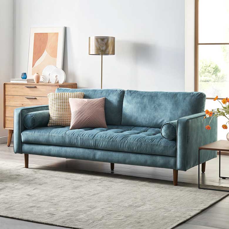 Aquamarine mid-century modern sofa with classic biscuit tufting, round bolsters and tapered legs