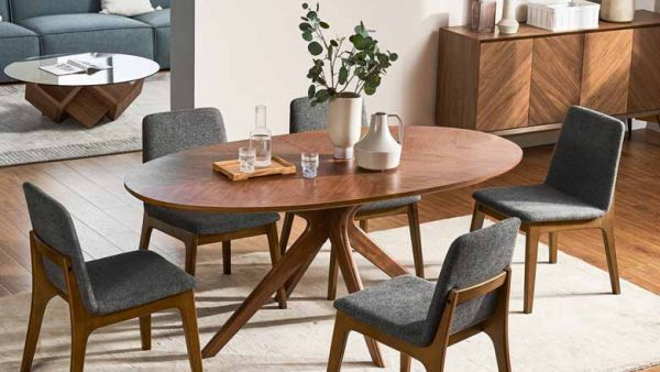 Oval dining table for sale with walnut tabletop and solid wood legs