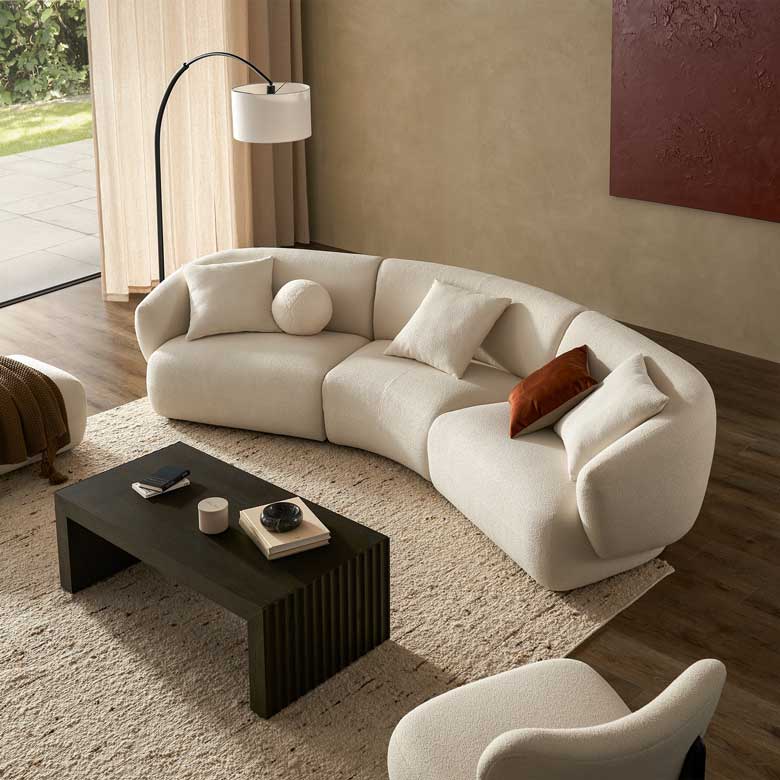 Performance boucle curved three-seater sofa