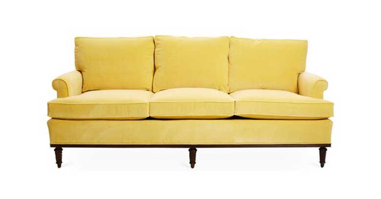 Yellow sofa with classic roll arms